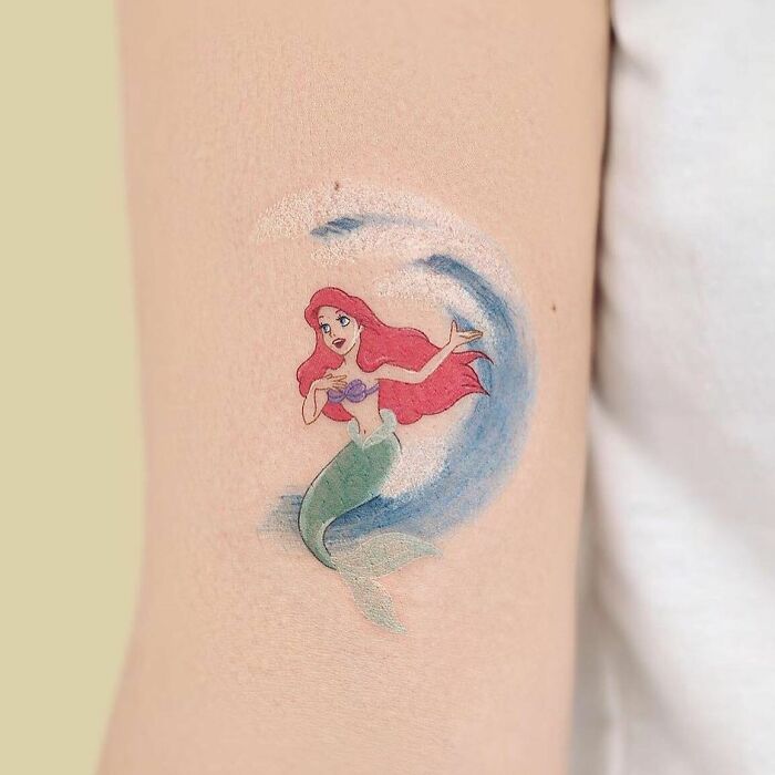 Ariel from The Little Mermaid arm tattoo