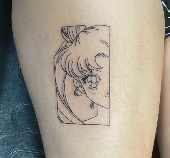 Fine line Sailor Moon thigh tattoo