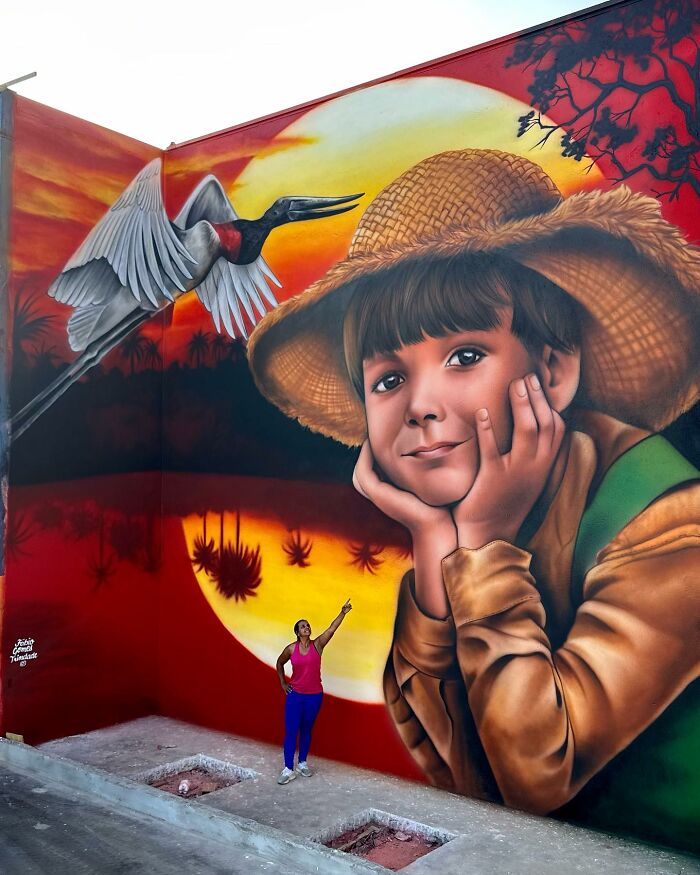 Street Artist Continues To Paint Portraits On Walls Next To Trees That Double As Hair Street Artist Continues To Paint Portraits On Walls Next To Trees That Double As Hair