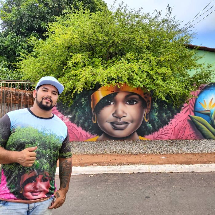Street Artist Continues To Paint Portraits On Walls Next To Trees That Double As Hair Street Artist Continues To Paint Portraits On Walls Next To Trees That Double As Hair