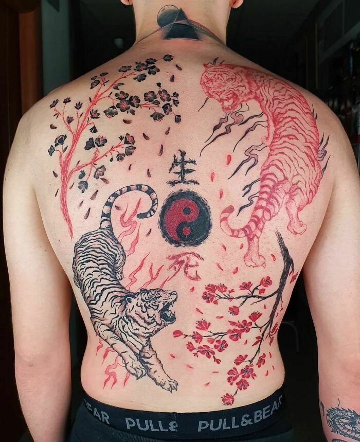 Two tigers around yin yang symbol tattoo