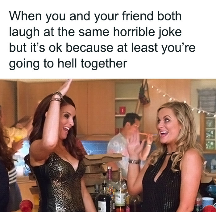 Two friends at a party, laughing and high-fiving over a relatable friendship meme.