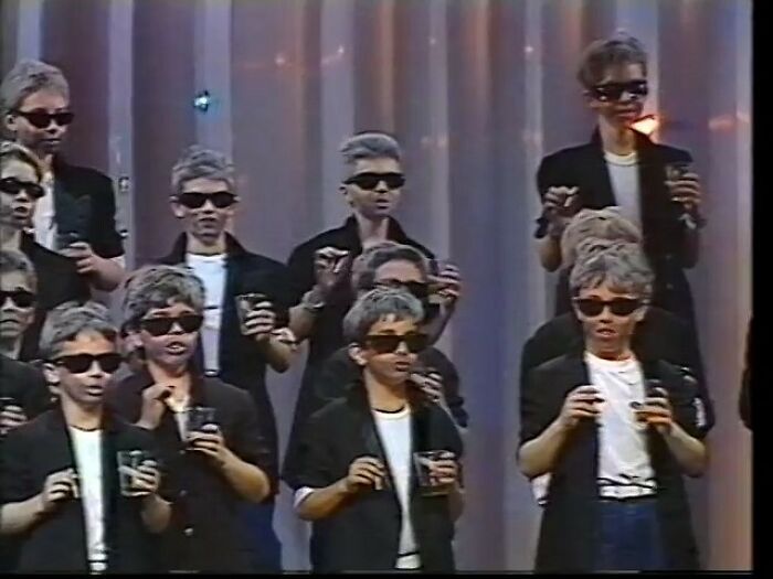 On A TV Appearance Toward The End Of His Life In 1988, Serge Gainsbourg Was Surprised By A Choir Of Children (Les Petits Chanteurs D’asnières) In Full Gainsbourg Regalia—black Jacket, Gray Wig, Sunglasses, Whisky, Cigarette, Unshaven—and Brought To Tears By Their Homage To One Of His Classics – “J’e Suis Venu Te Dire Que Je M’en Vais”