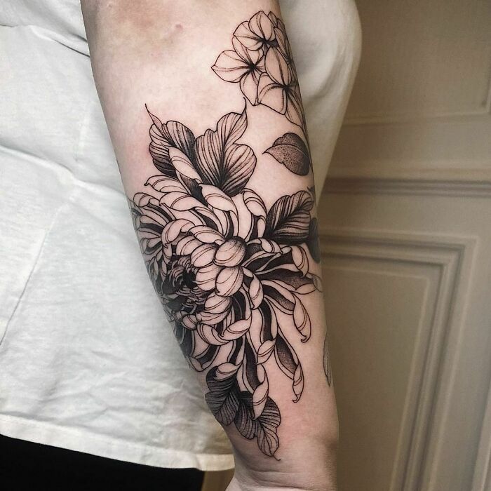 Chrysanthemums forearm tattoo