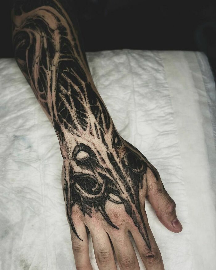 dark detailed arm and hand piece