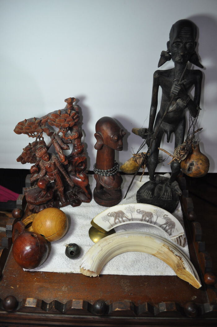 I Own Lots Of Odd Stuff But I'll Just Post A Couple Of Photos. Clockwise (More Or Less) - Small Round - Quaker Horse Sleigh Bell - Salem County, Late 1800s - Bronze. Large Rounds - Wooden Korean Moktaks (Woodend Handbell Used By Buddhists). Wooden Carving - Hunter Scene. Unsure Of Country. Depicts What Would Perhaps Be A Traditional English Hunter But The Man Looks Asian. Asian Signature On Bottom But I Don't Know Which Language. Wooden Fertility Statue. Africa (Continent) But Unsure Which Country. Possibly Kenya. Wooden Medicine Man Carving. Same Source As The Fertility Statue. Hippo Teeth - Engraved And Raw. From A Sustainable / Legal Source Many Years Ago