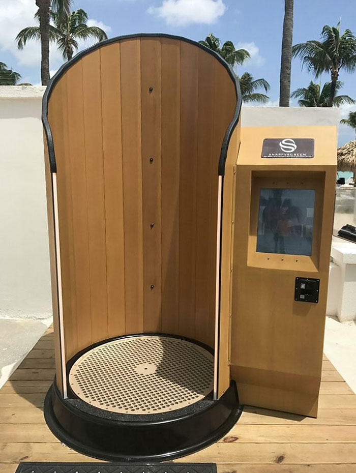 This Hands-Free Sunscreen Machine That Rotates As It Sprays Your Body With Sunscreen