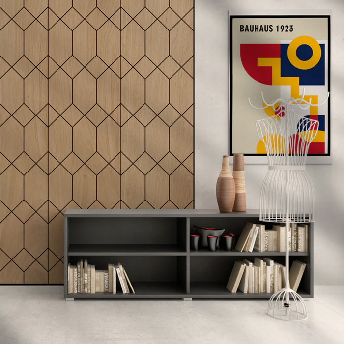 Geometric minimal wooden wall panels in room with low cupboard and Bauhaus poster