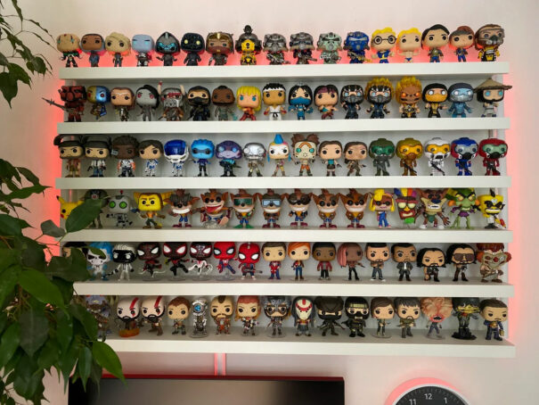 Funko Pop collection displayed on stackable shelf
