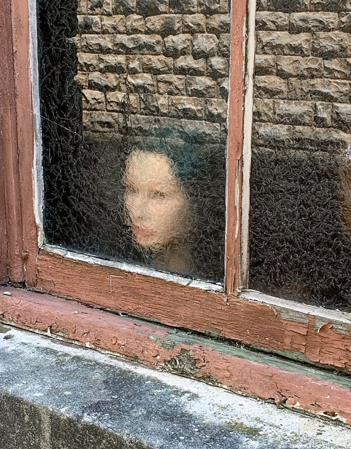 This Mannequin Head Obscured Behind An Old Window Startled Me As I Walked By