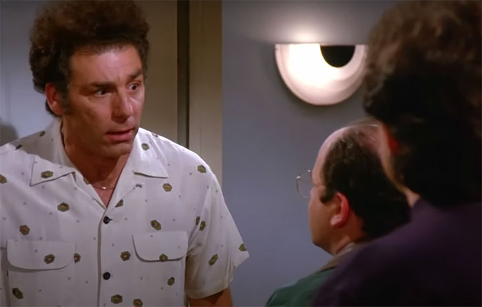 Cosmo Kramer wearing gray shirt