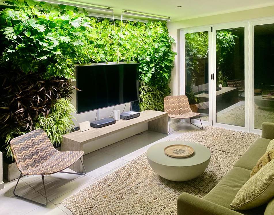 Vertical garden accent wall design inside living room