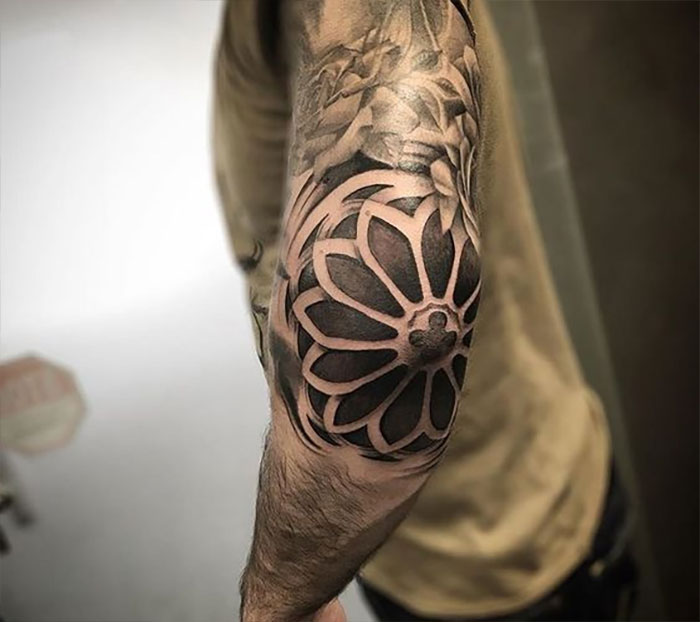 Flower elbow tattoo
