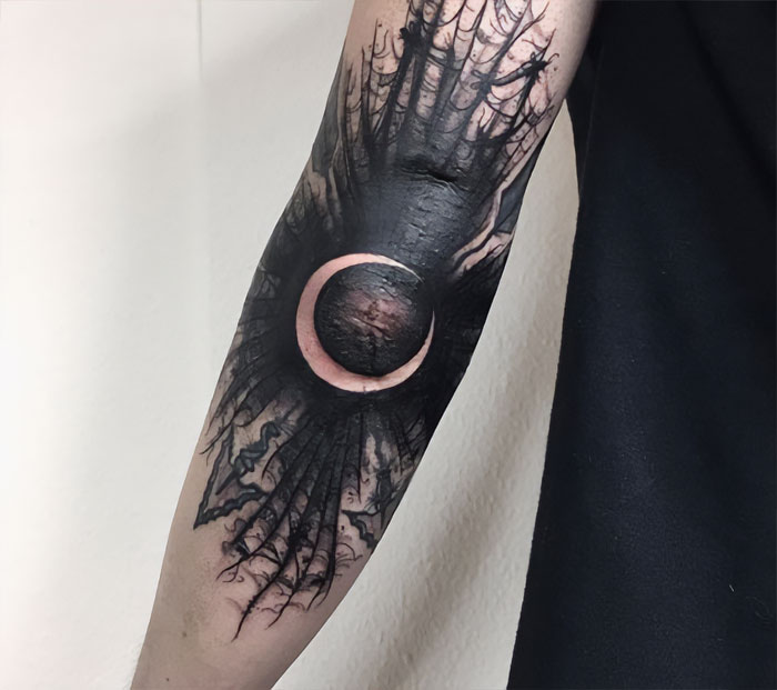 Moon elbow tattoo
