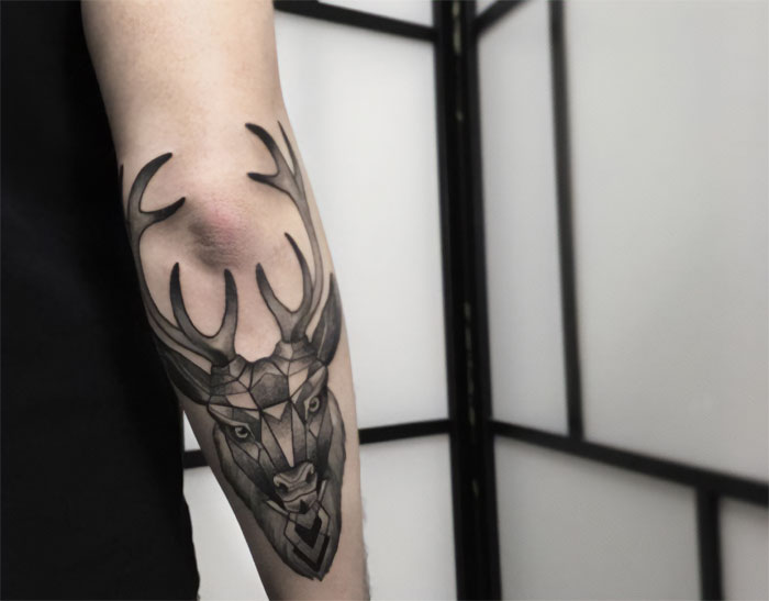 Deer elbow tattoo