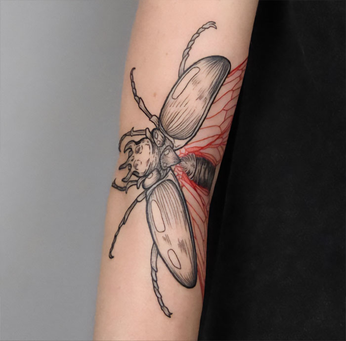 Firefly elbow tattoo