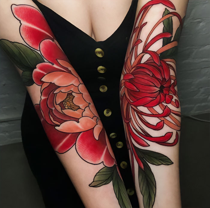 Watercolor red flower elbows tattoo