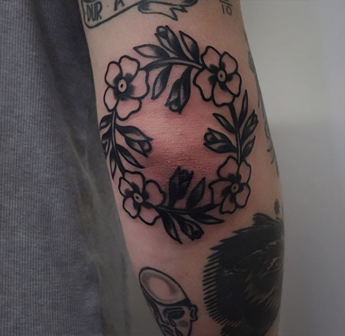 Flowers elbow tattoo
