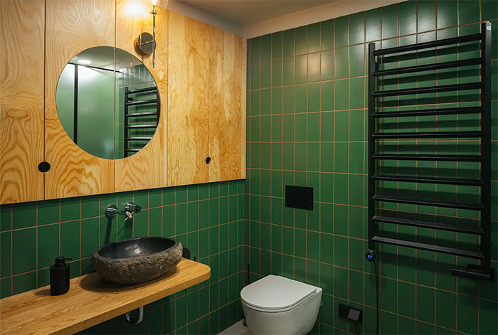Wooden Accent Wall In A Modern Green Bathroom