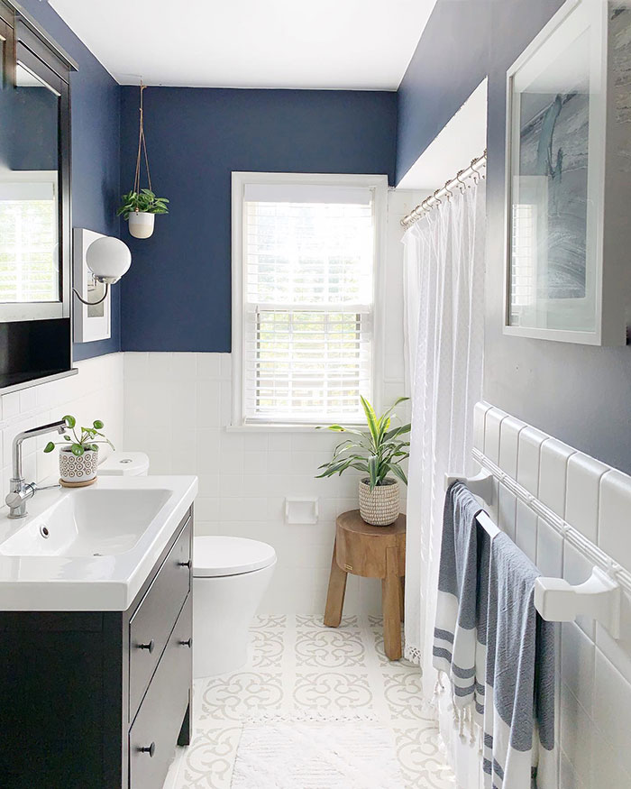 Freshly Painted White Titles In Blue And White Bathroom