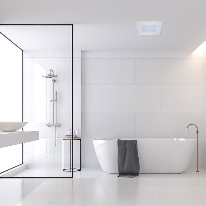 Bright White bathroom with ventilation on ceiling 