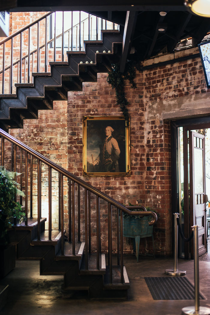 Brick wall and classic staircase design