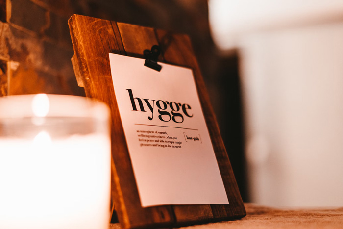 Wooden frame with script definition of the word 'hygge'