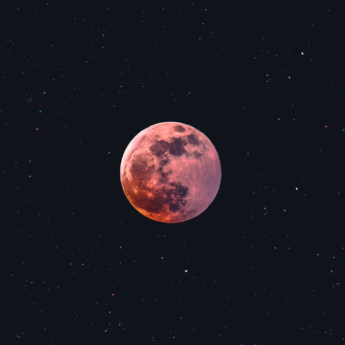 red moon with stars