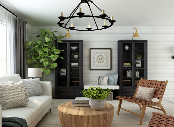 Living room with black metal stand on brown wooden round table
