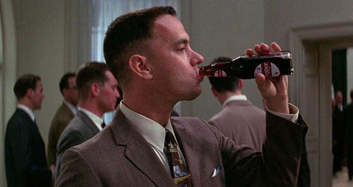 Forrest Gump drinking Dr. Peppers