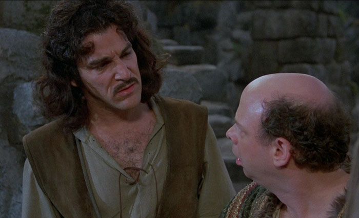 Inigo Montoya and Vizzini looking at each other
