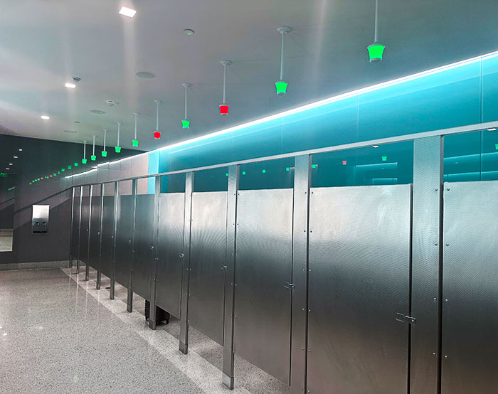 This Airport Bathroom Has Green And Red Lights Above The Stalls To Show Which Ones Are Occupied