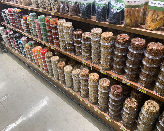 This Grocery Store Displays Nuts And Other Snacks Upside Down So You Can See The Contents More Clearly
