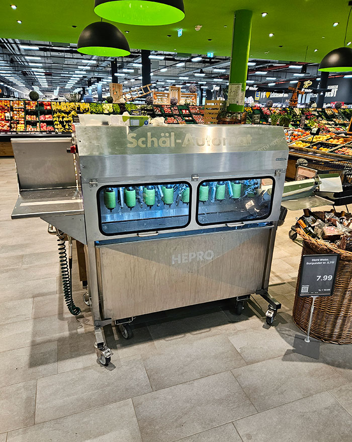 An Asparagus Peeling Machine For White Asparagus In A Supermarket In Germany