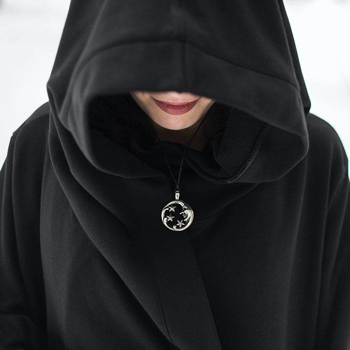 Woman wearing black hoodie