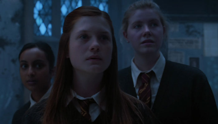Ginny Weasley looking with interest