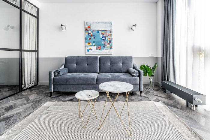 Art Deco living room featuring a gray sofa, marble tables, and designer-inspired interior refresh ideas. Art Deco living room featuring a gray sofa, marble tables, and designer-inspired interior refresh ideas.