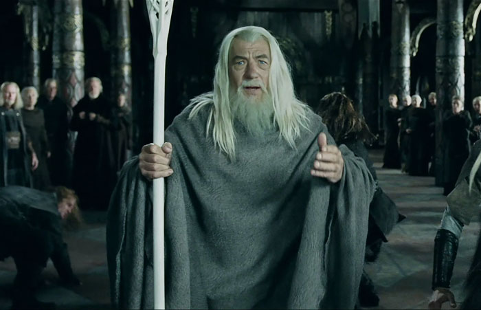 Gandalf in the castle with a staff in his hand