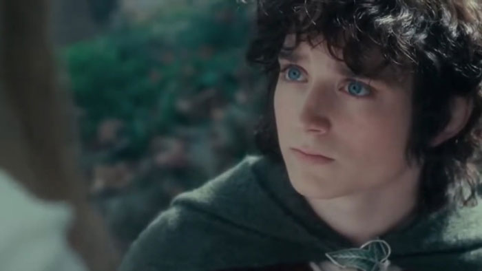 Frodo Baggins looking at Galadriel
