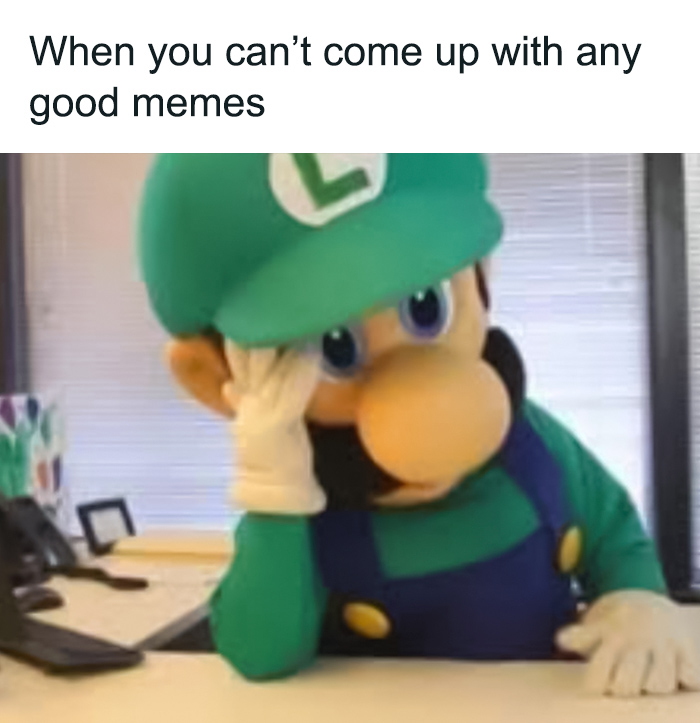 Luigi sits at desk and thinks of good memes