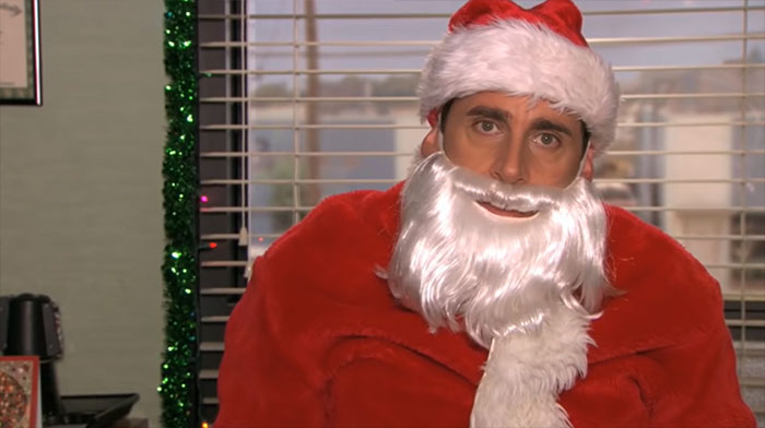 Michael Scott wearing Santa costume