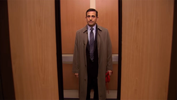 Michael Scott waiting for the elevator to close