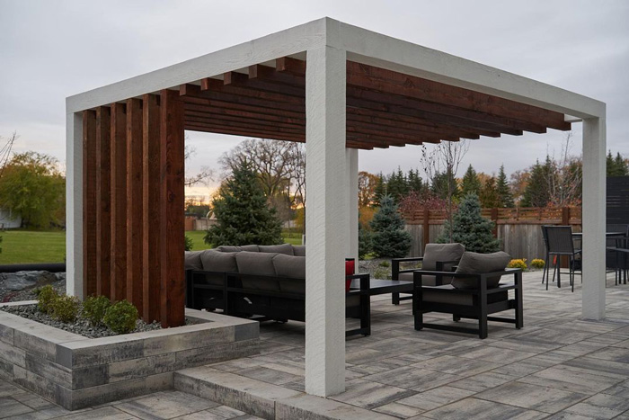 modern pergola on the backyard above the couch