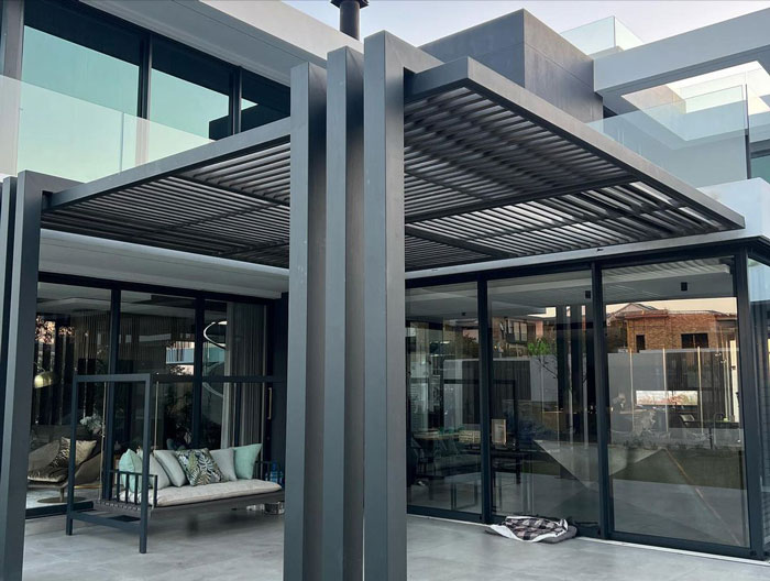 classic attached steel pergola on the patio