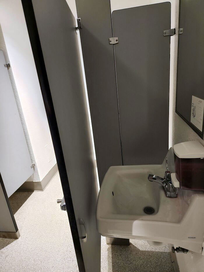 This Stall Door That Hits Anyone Standing At The Sink Washing Their Hands
