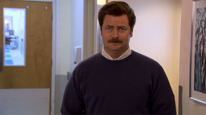Ron Swanson standing in front of the camera