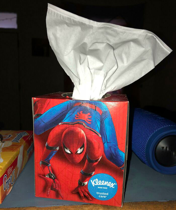 Spiderman-themed Kleenex box with tissues, featuring a vibrant superhero design.