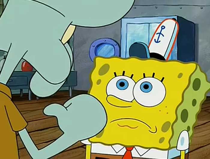 Squidward telling off spongebob while spongebob looks disappointed 