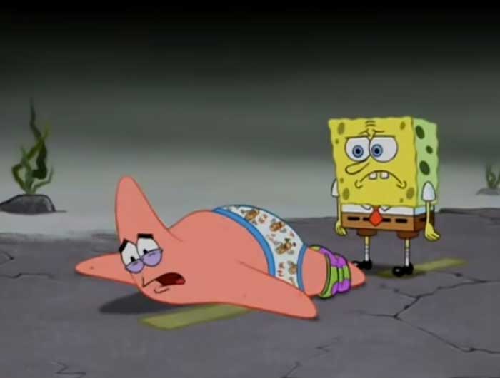 Patrick on the ground with pants down while spongebob is looking at him with disappointment 