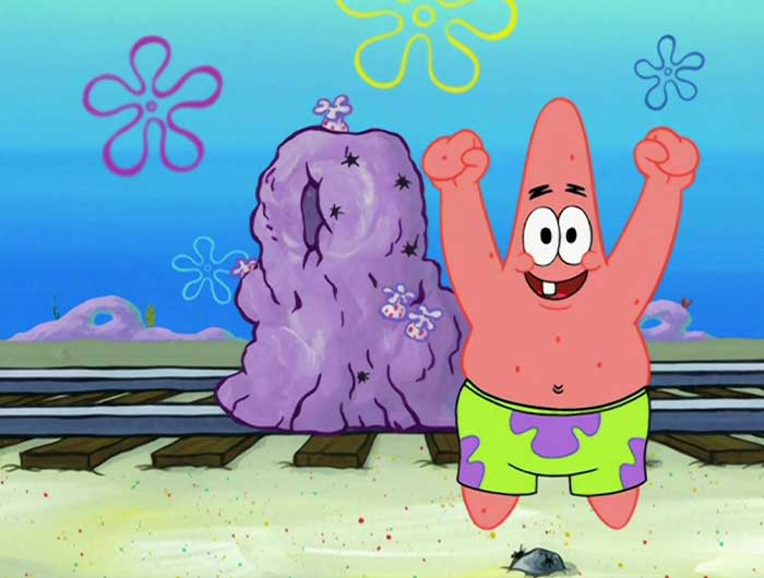 Patrick Star looking very excited with arms up